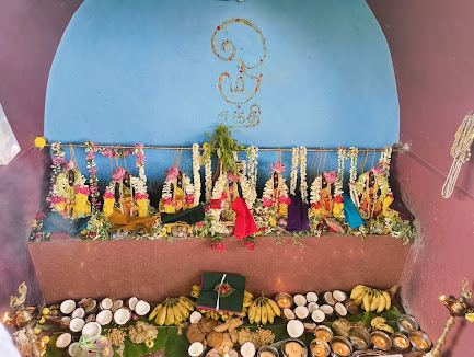 Deities of Sri Kannimar temple decorated with garlands and offerings