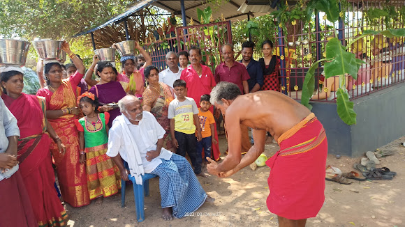 Priest performing pooja rites