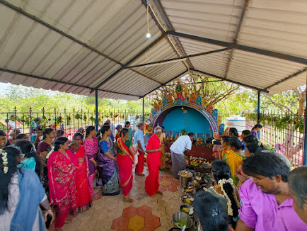 Devotees carrying kalasam